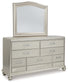 Coralayne King Upholstered Bed with Mirrored Dresser and Chest